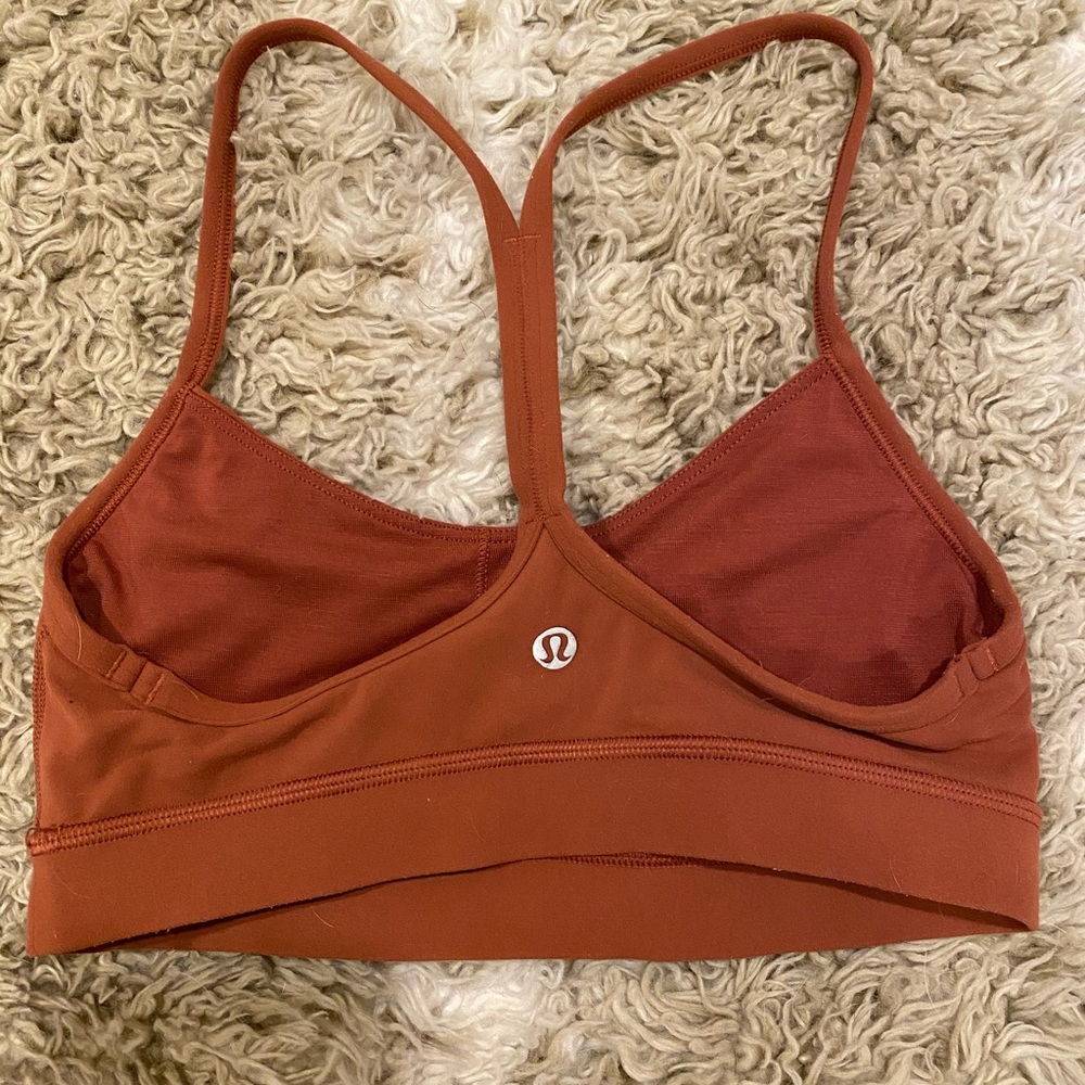 Rust/burnt orange lululemon flow Y sports bra